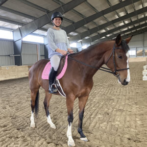 Helena on Siouxsie in an indoor arena